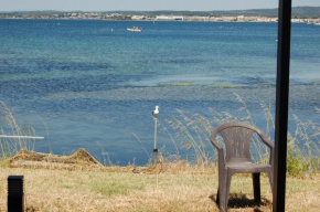 maison atypique les pieds dans l'eau